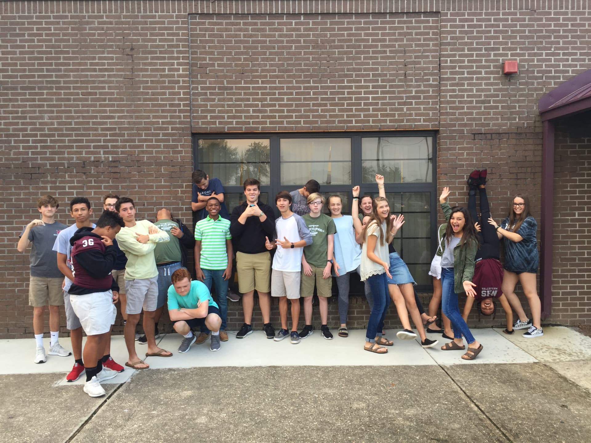 Students having fun during a class photo